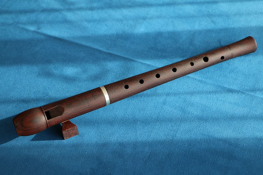 brown, flute, blue, textile, music, recorder, wood, close-up, single object, indoors