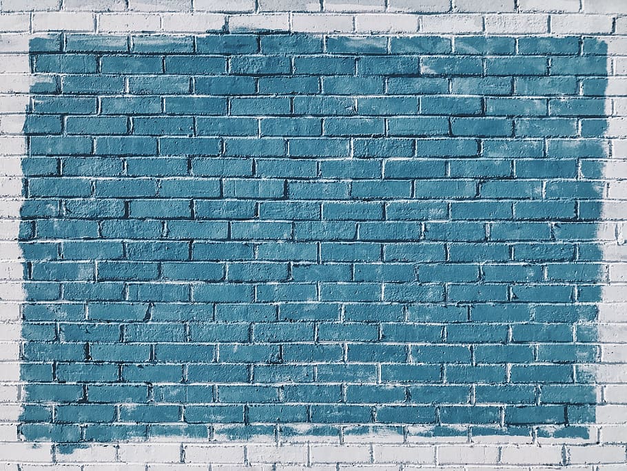 close-up photo, blue, painted, concrete, brick wall, wall, bricks, paint, rocks, pattern