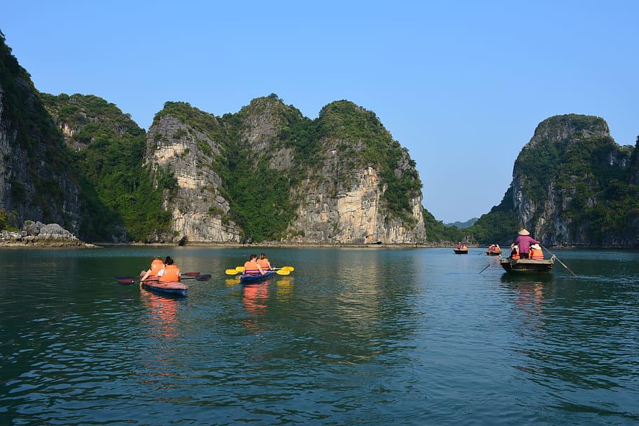 people riding kayaks, Ha Long Bay, Vietnam, Travel, Cruise, kayaking, sea, mountain, water, scenics