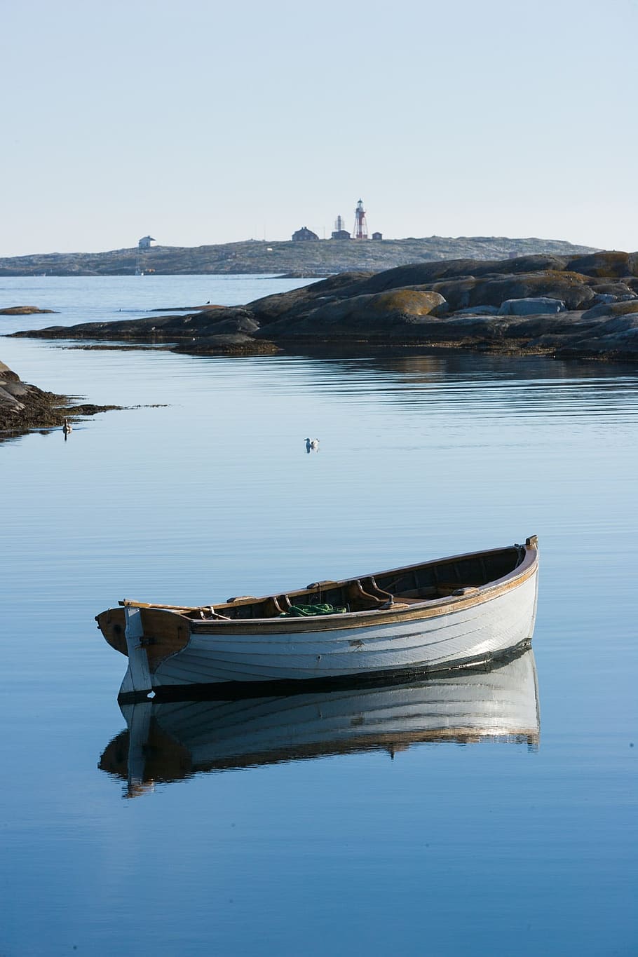 white, rowboat, calm, body, water, sky, daytime, lighthouse, boat, sea