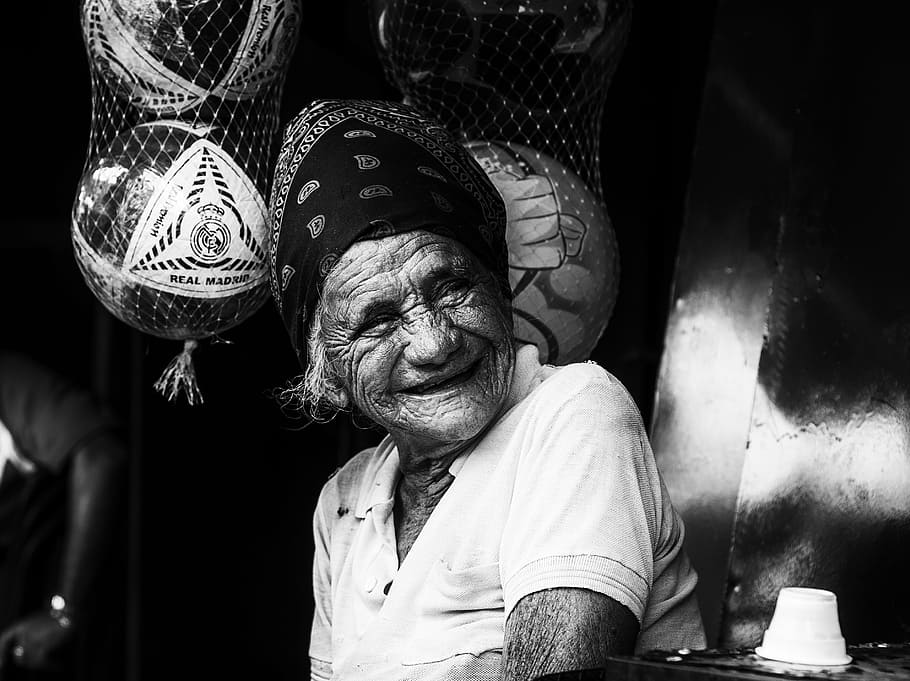 grayscale photo, smiling, woman, wearing, white, polo shirt, maracaibo, venezuela, old, older