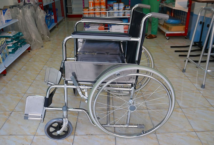 black, silver wheelchair, top, brown, ceramic, floor tikles, wheelchair, disabled, handicapped, disability