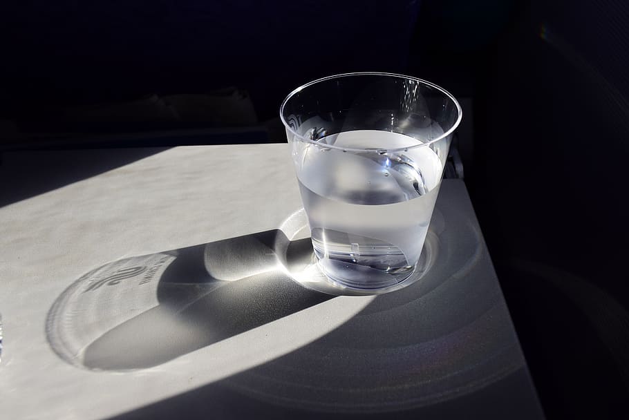 glass cup, water, white, panel, a cup of water, shadow, lonely, light and shadow, sunshine, glass