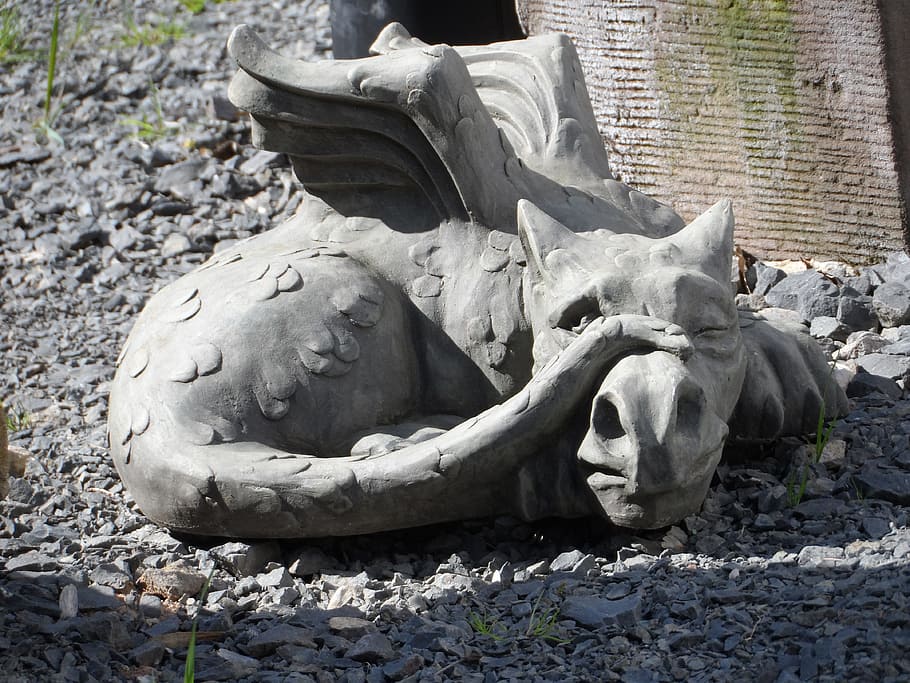 gray dragon statue, sculpture, dragon, stone, horticulture, outside art, artwork, plastic, subject, art object