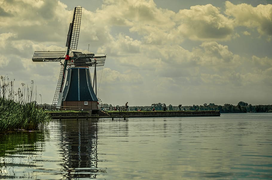 windmill, lake, water, sky, clouds, architecture, waterfront, built structure, renewable energy, fuel and power generation
