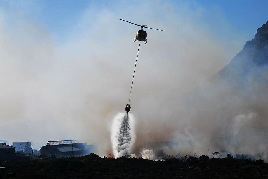 flying helicopter, helicopter, fire, smoke, fire fight, fire fighting, air response, water bag, helicopter bucket, water bomb