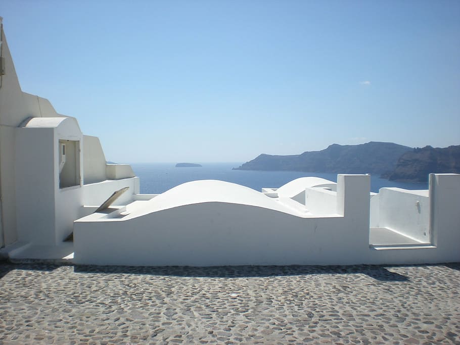 santorini, isla griega, grecia, caldera, panorama, oia, color blanco, cielo, luz solar, naturaleza