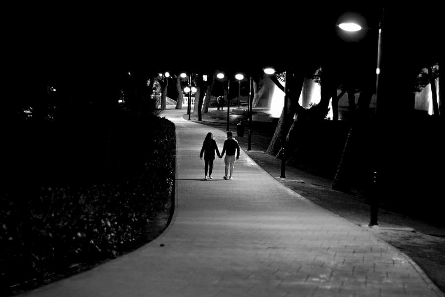 grayscale photo, male, female, holding, hands, light posts, love, couple, boys, teens