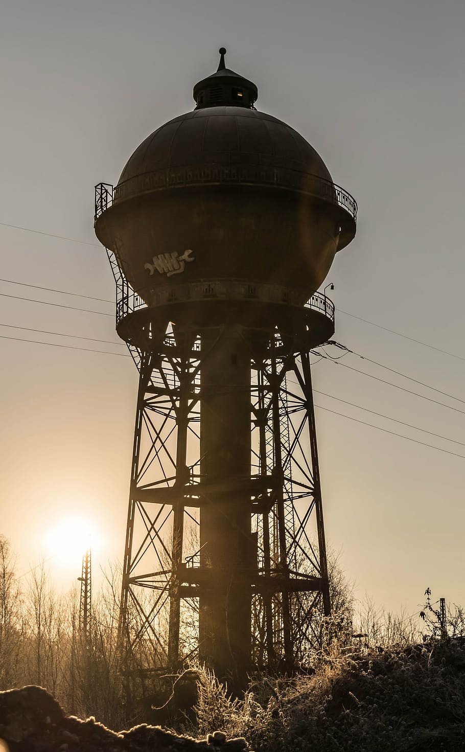 photography, brown, metal tank, post, daytime, tower, water tower, memory, back light, architecture