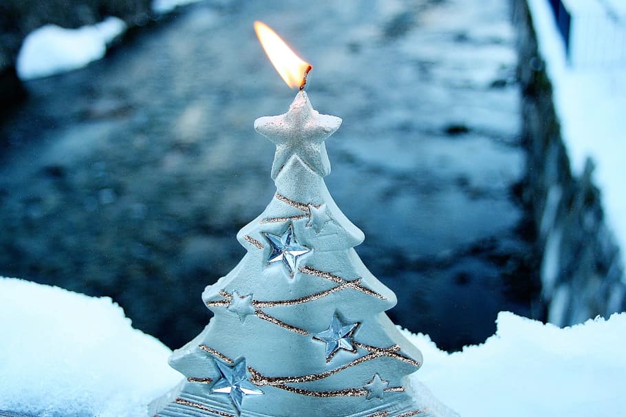 selective-focus photography, lit, white, christmas tree candle, asterisk, candle, christmas, the scenery, snow, winter