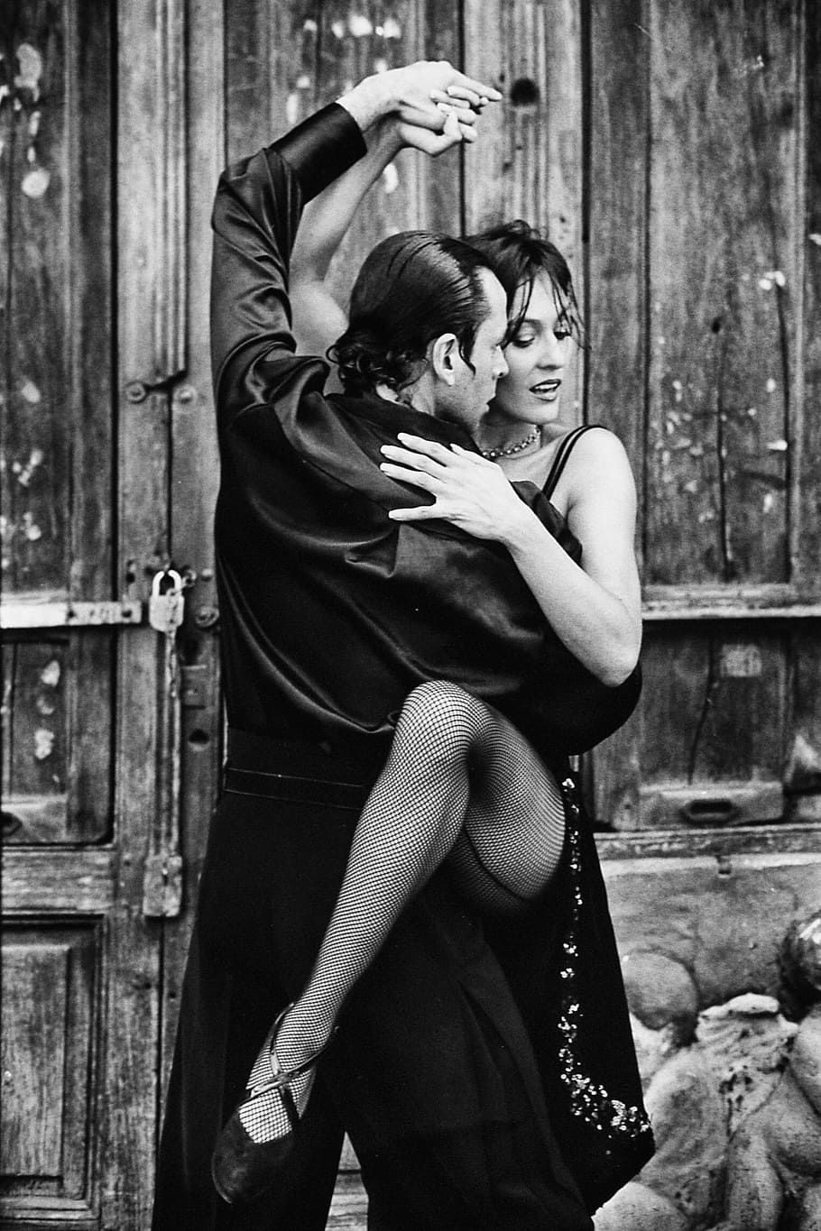 grayscale photo, man, holding, woman, dress, tango, dancing, couple, dance style, rhythm