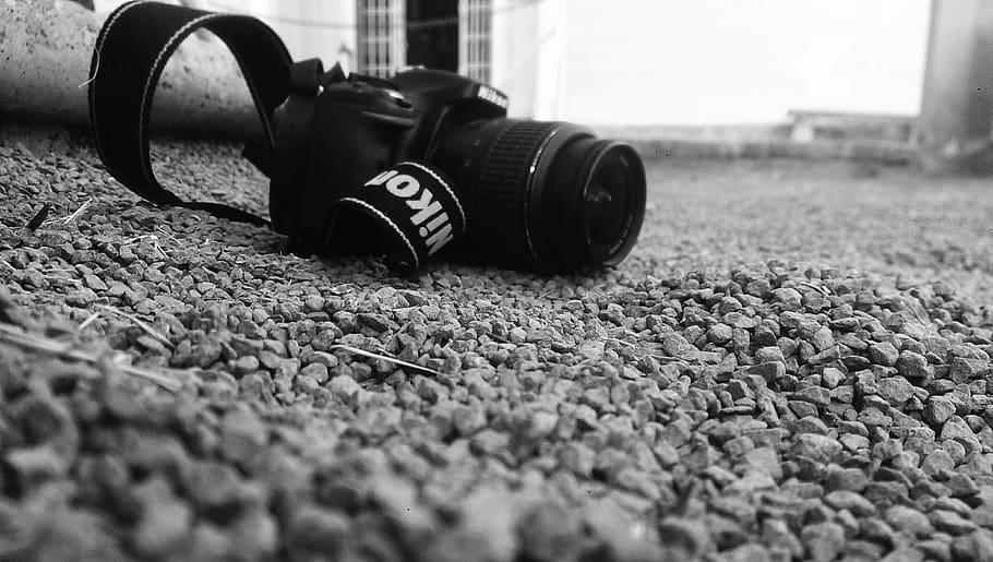 camera, nikon, lens, black, strap, photography, stones, rock, outdoor, blur