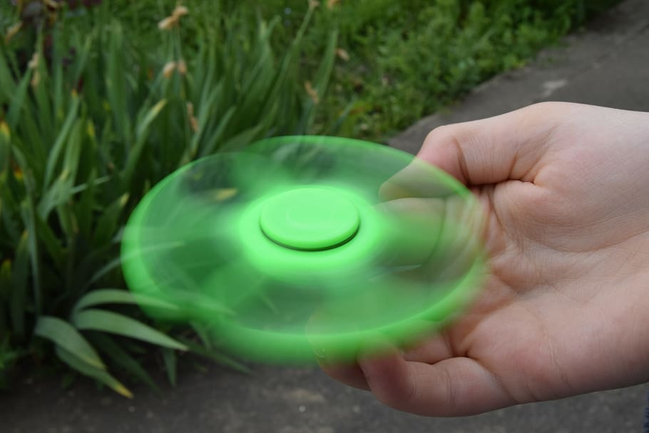 Hand, Spinner, Top, Toy, Game, hand spinner, green color, human body part, one person, holding