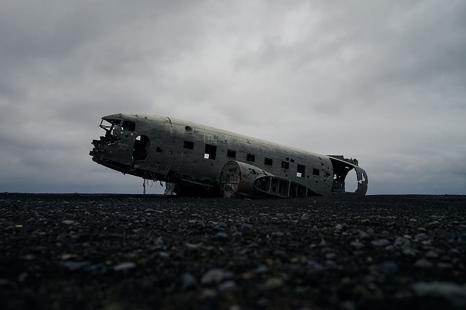 aircraft, fuselage, overcast, wreck, wreckage, transportation, sky, abandoned, mode of transportation, nature
