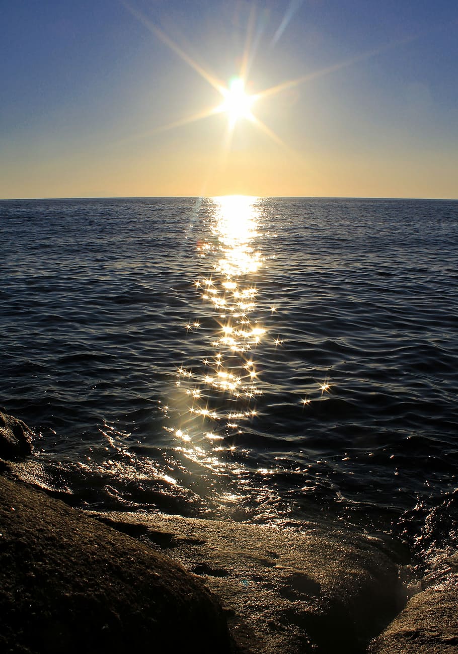 Puesta de sol, mar, sol, estrellas, luz de fondo, horizonte sobre el agua, luz solar, rayo de sol, cielo, agua