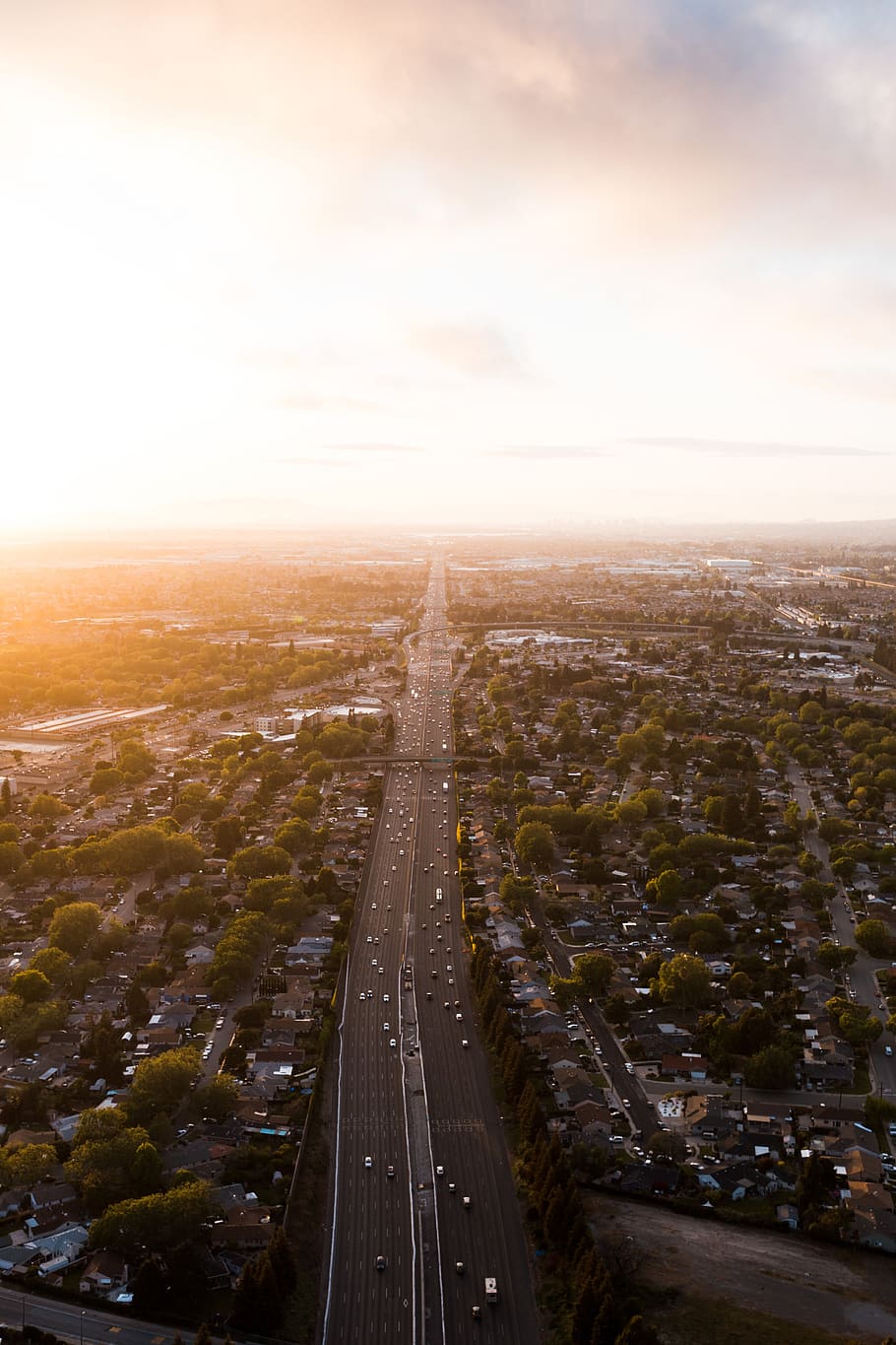 aerial, commute, roads, sunset, sky, clouds, cars, travel, infrastructure, trees