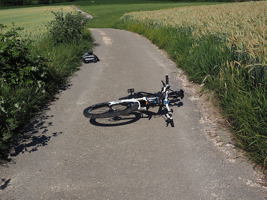 bicycle on road, bike, accident, mountain bike, fell down, fall, bike accident, overthrown, misfortune, overturned